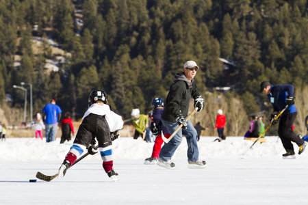 2012-2013 Winter Season. Ice skating on Evergreen Lake, Colorado.