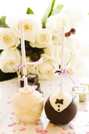 Chocolate cake pops decorated for wedding party.の写真素材