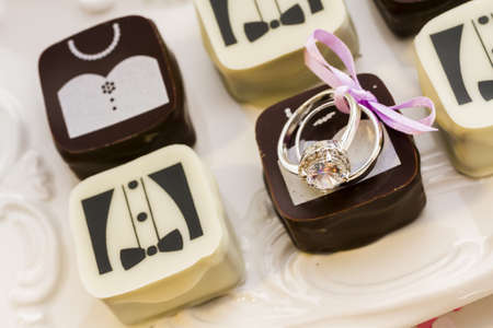 Small chocolates decorated for the wedding party.の写真素材