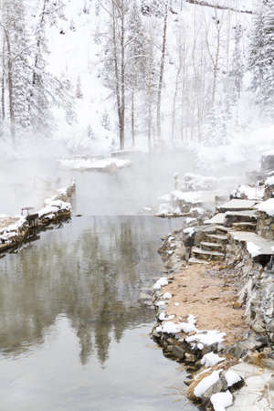 Strawberry Hot Springs surrounded by winter forest.の写真素材