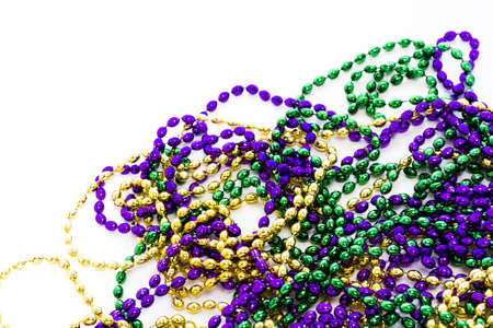 Mardi Gras beads on white backgound.の写真素材