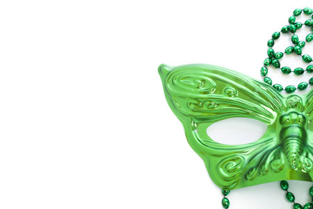 Mardi Gras green beads and mask on white backgound.の写真素材