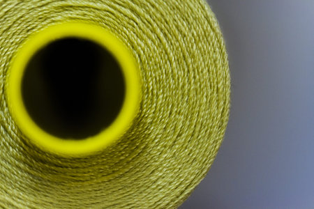 Colorful spools of thread on the wall in tailor shop.