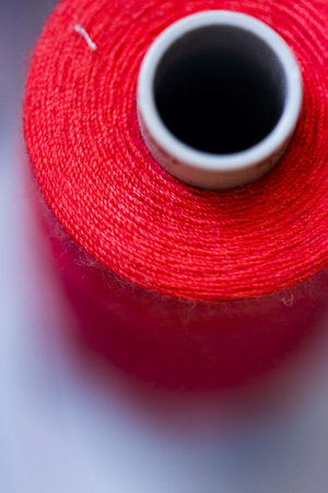 Colorful spools of thread on the wall in tailor shop.