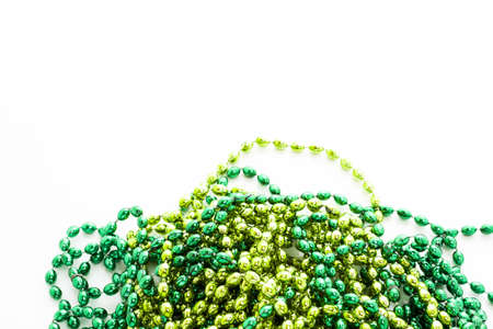St. Patricks Day beads on white background.の写真素材