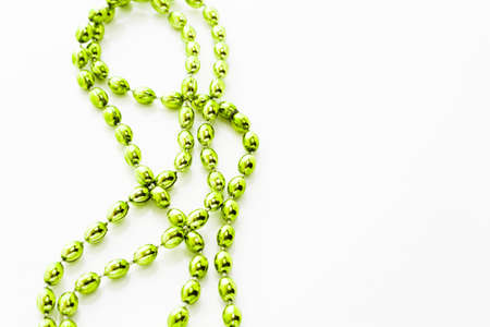 St. Patricks Day beads on white background.の写真素材