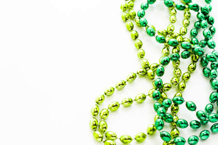 St. Patricks Day beads on white background.の写真素材