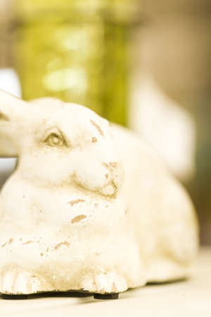 Easter rubbit figurine decorating a table.の写真素材