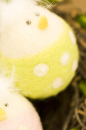 Handmade easter egg in nest.