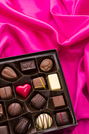 Assorted gourmet chocolate in a box.の写真素材