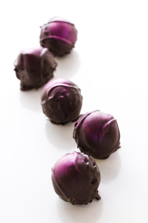 Gourmet raspberry truffles hand made by chocolatier.