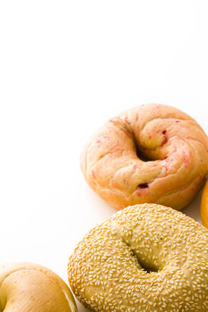 A variety of delicious, freshly baked bagels.の写真素材