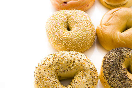 A variety of delicious, freshly baked bagels.の写真素材