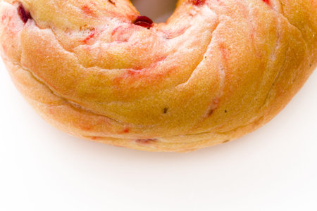 Freshly baked cranberry bagel.の写真素材