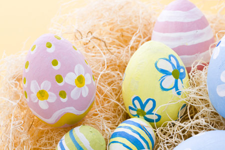 Hand painted Easter eggs wwith rought strokes of the brush.