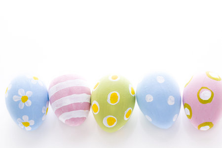 Hand painted Easter eggs wwith rought strokes of the brush.