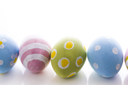 Hand painted Easter eggs wwith rought strokes of the brush.