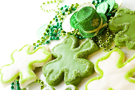 White chocolate shorrbread cookies in shape of four clover leaf for St. Patrics Day.の写真素材