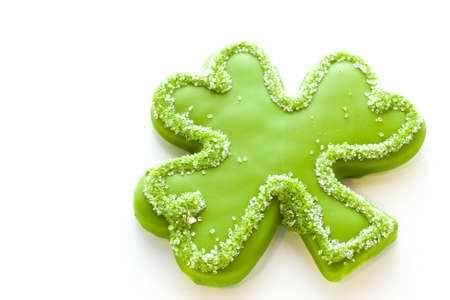 White chocolate shorrbread cookies in shape of four clover leaf for St. Patrics Day.の写真素材