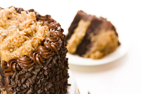 German chocolate cake with two layers of chocolate cake filled and topped with classic German...