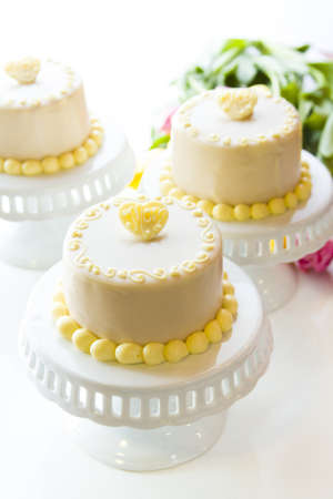 White chocolate honey lavender cake made with sponge cake infused with honey and filled with layers of lavender mousse, covered in white chocolate.の写真素材