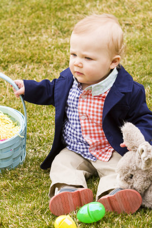 A young family with baby boy in the park on a nice Spring day.