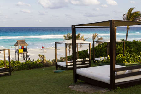 Beach cabanas at vacation resort in Cancun, Mexico.のeditorial素材