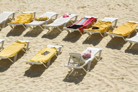 White chairs on the beach of the Caribbean Sea.のeditorial素材
