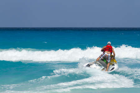 Having fun on jet ski at the Caribbian sea.のeditorial素材