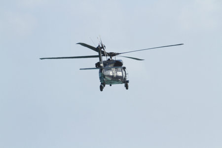 Policia Federal helicopter flying over the beach.