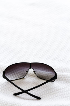 black sunglasses on fabric.の写真素材