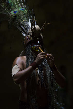 Maya people dressed in traditional mayan outfit for performance.のeditorial素材