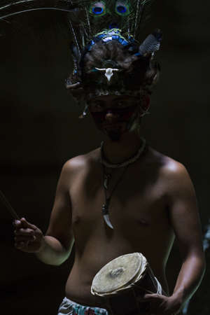 Maya people dressed in traditional mayan outfit for performance.のeditorial素材