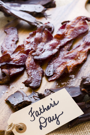 Chocolate covered bacon with salt.の写真素材