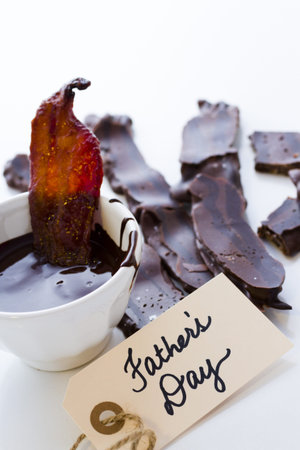 Chocolate covered bacon with salt.の写真素材