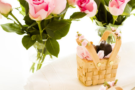 Miniature picnic baskets favor boxes filled with truffles.の写真素材