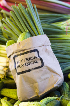 Fresh produce on sale at the local farmers market.の写真素材