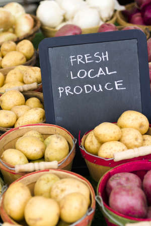 Fresh produce on sale at the local farmers market.の写真素材