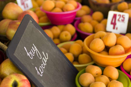 Fresh produce on sale at the local farmers market.の写真素材