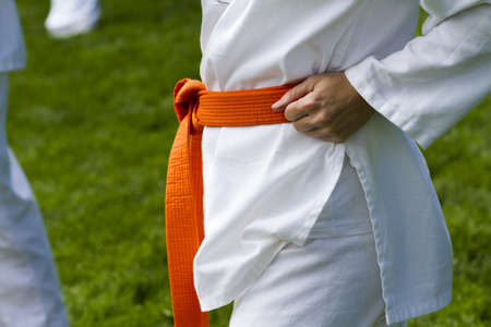 Tae Kwon Do student practicing in the park.の写真素材