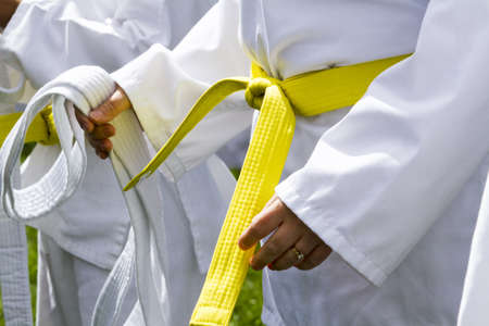 Tae Kwon Do student practicing in the park.の写真素材
