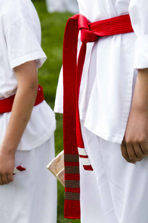 Tae Kwon Do student practicing in the park.の写真素材