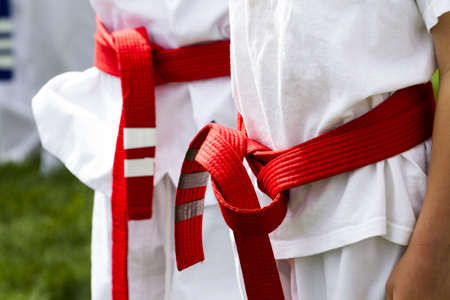 Tae Kwon Do student practicing in the park.の写真素材