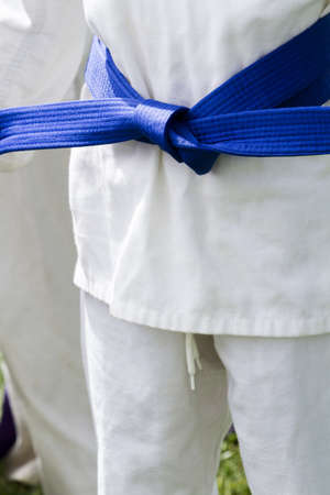 Tae Kwon Do student practicing in the park.の写真素材
