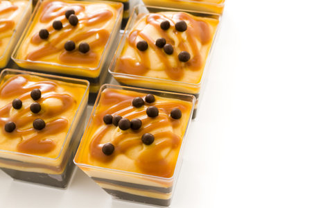 Small chocolate caramel parfait cups at dessert bar.の写真素材