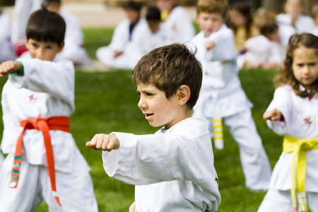 Tae Kwon Do student practicing in the park.のeditorial素材