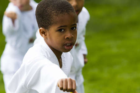 Tae Kwon Do student practicing in the park.のeditorial素材