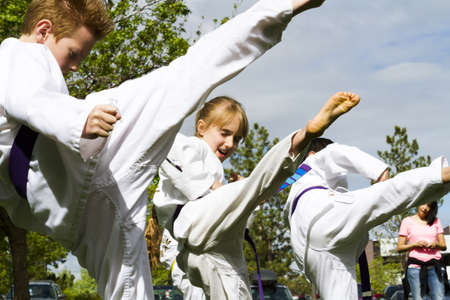 Tae Kwon Do student practicing in the park.のeditorial素材