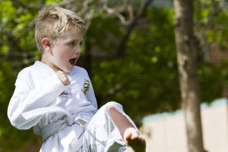 Tae Kwon Do student practicing in the park.のeditorial素材