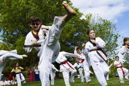 Tae Kwon Do student practicing in the park.のeditorial素材